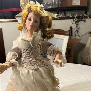Elegant Porcelain Doll with Lace Dress